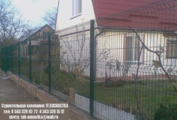 Ограждение многоквартирного дома забором